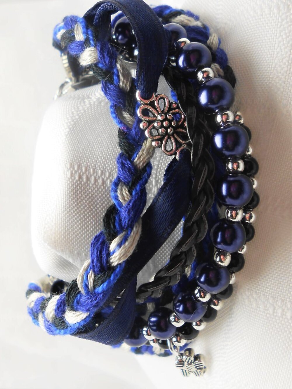 Handmade bracelet with rows of threads, beads, and charms No. 185